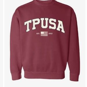 TPUSA collegiate crewneck sweatshirt.
